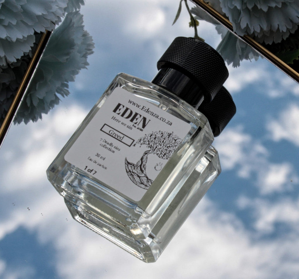 Eden perfume bottle with a cloudy sky background
