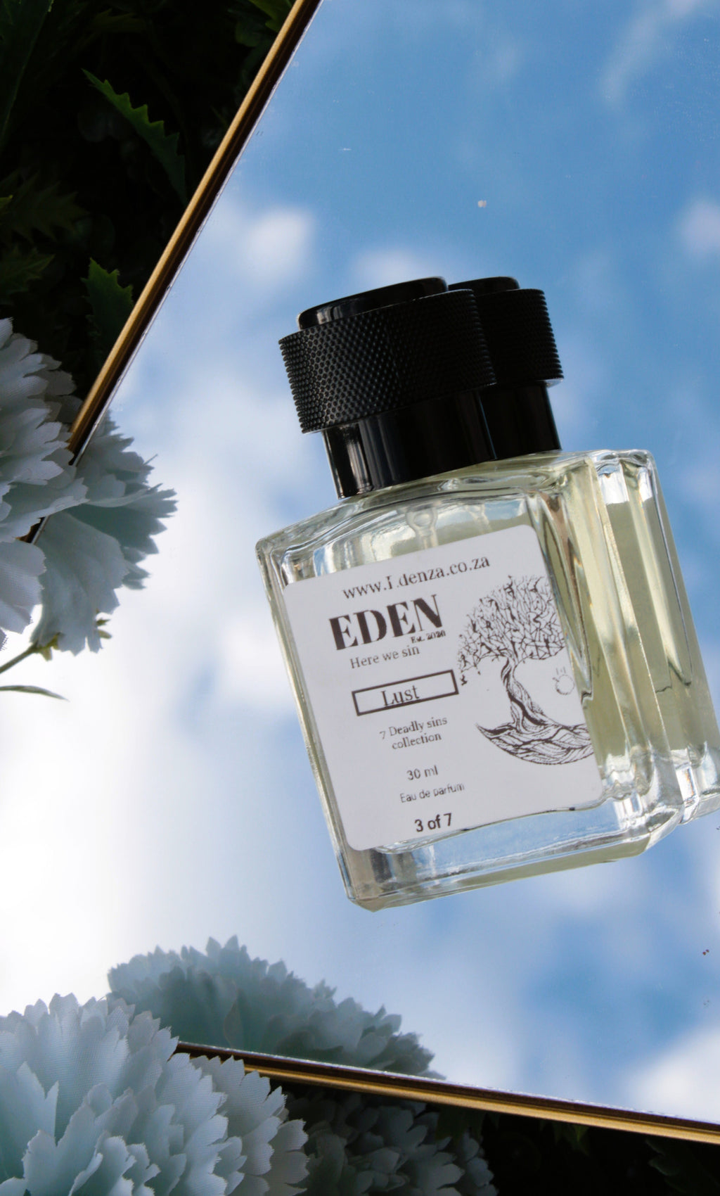 Eden perfume bottle with floral background